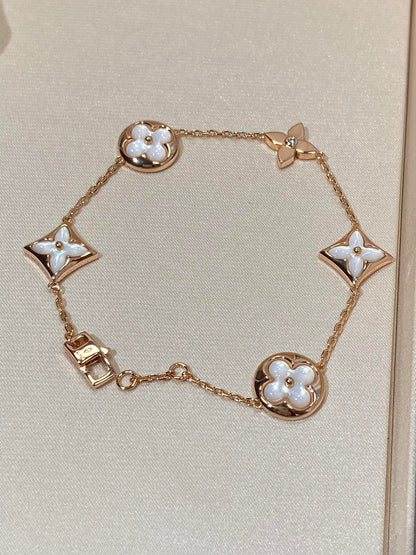 [BLUE TEARS]STAR AND SUN 5 MOTIF MOP PINK GOLD BRACELET