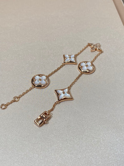 [BLUE TEARS]STAR AND SUN 5 MOTIF MOP PINK GOLD BRACELET