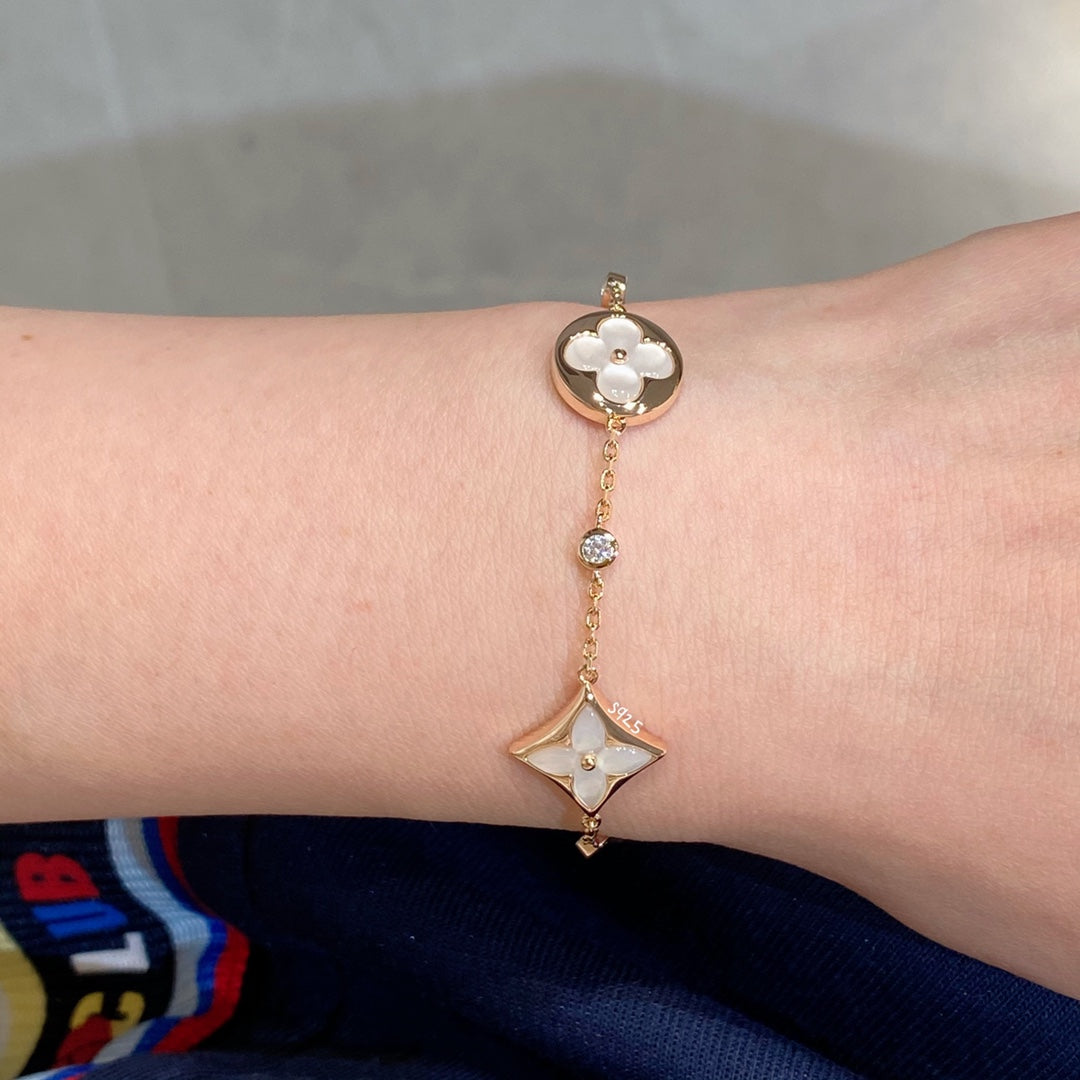 [BLUE TEARS]STAR AND SUN 4 MOTIF WHITE MOP PINK GOLD BRACELET