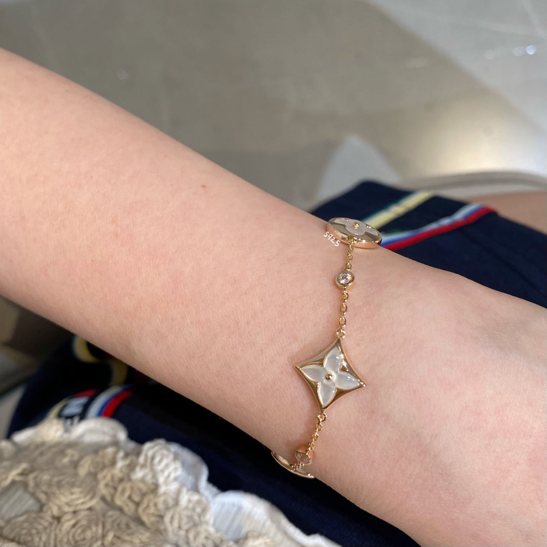 [BLUE TEARS]STAR AND SUN 4 MOTIF WHITE MOP PINK GOLD BRACELET