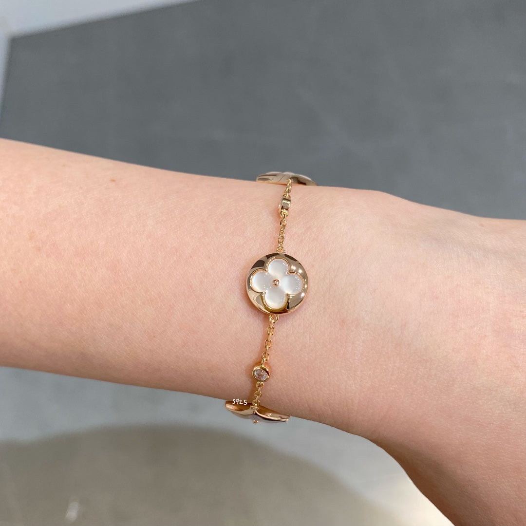 [BLUE TEARS]STAR AND SUN 4 MOTIF WHITE MOP PINK GOLD BRACELET