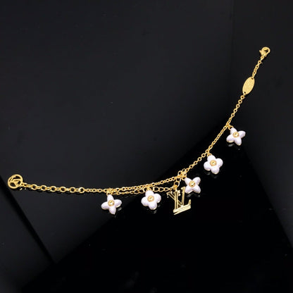 [BLUE TEARS]LOGO 6 MOTIF STAR AND SUN GOLD BRACELET
